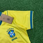 Camisa Brasil Home I - Copa do Mundo 2026 – Amarela – Feminina