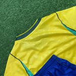 Conjunto Infantil Brasil Home I 26/27 – Amarelo e Azul – Nike
