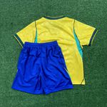 Conjunto Infantil Brasil Home I 26/27 – Amarelo e Azul – Nike