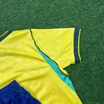 Conjunto Infantil Brasil Home I 26/27 – Amarelo e Azul – Nike