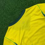 Camisa Brasil Home I 26/27 - Amarela - Feminina