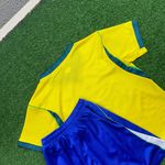 (VAZADO) Conjunto Infantil Brasil Home I - Copa do Mundo 2026 – Amarelo/Azul 