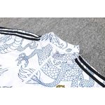 AGASALHO TREINO REAL MADRID DRAGAO MEIO ZIPER 23/24 - BRANCO E PRETO