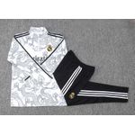 AGASALHO TREINO REAL MADRID DRAGAO MEIO ZIPER 23/24 - BRANCO E PRETO