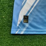 Camisa Manchester City 25/26 HOME Feminina