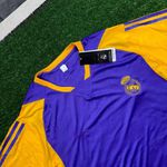 Camisa Real Madrid 2023/24 - Roxo/Amarelo