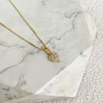 Colar com Pingente de Coração Cravejado Folheado em Ouro 18k