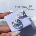 Alianças Ravena com 7 mm com 3 pedras de zirconia com detalhes recartilhados com solitario love azul