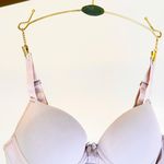 SUTIÃ MEIA TAÇA COM BOJO E ARO E COM BASE EMBUTIDA EM MICROFIBRA - BASE