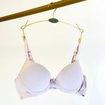 SUTIÃ MEIA TAÇA COM BOJO E ARO E COM BASE EMBUTIDA EM MICROFIBRA - BASE