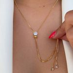 Colar gravatinha com ponto de luz 