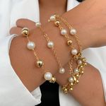 Pulseira de perola e esferas (cada)