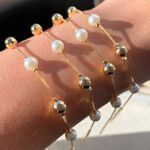 Pulseira de esfera com perola (cada)