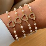 Pulseira de perola com coração (CADA)