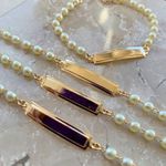 Pulseira de perola com plaquinha infantil (cada)