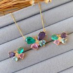 Conjunto de borboleta na zircônia colorida 
