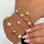 Pulseira de perola e esferas (cada)