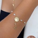 Pulseira de perola nossa senhora com espirito santo 