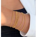 Pulseira corda de violão com bolinhas