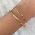 Pulseira dupla de malha com coração vazado 