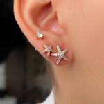 Trio de brinco de estrela cravejada com ponto de luz 