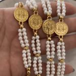 Pulseira terço pérola branca São Bento