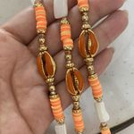 Tornozeleira madrepérola laranja