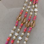 Tornozeleira búzio pink