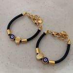 Pulseira Talismã no fio de borracha