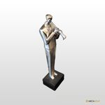 ESTATUETA FIGURA DE MUSICO CROMADO
