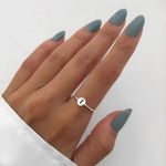 ANEL REDONDO LETRA T PRATA 925