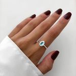 ANEL GOTA CRAVEJADO ZIRCÔNIA AZUL CLARO E CRISTAL PRATA 925