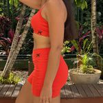 Conjunto bolso lateral laranja