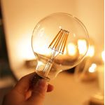 LÂMPADA LED ÂMBAR FILAMENTO VINTAGE GLOBO G80 4W 2200K BIVOLT 7543 TASCHIBRA