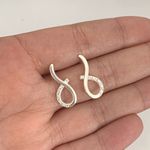 Brinco Metade Infinito com Zirconia Prata 925