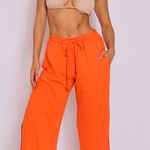 Pantalona laranja linho Tropical com fenda 