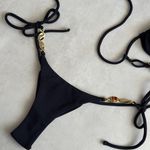 Calcinha Cannes biquíni fio duplo preto metal chapa Trituê
