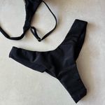Calcinha avulsa biquíni asa delta fio duplo Texas preto canelado Trituê 