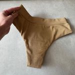 Calcinha biquíni hot pants textura dourado Trituê