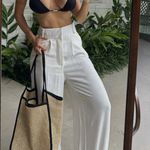 Calça Vicenza pantalona linho com bolsos off white Trituê