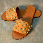Rasteira Flat Monopólio Júlia Couro Caramelo