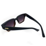 Óculos de sol HD Swell Animal print com armação e hastes pretas e lentes com proteção UV