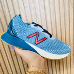 Tenis new balance full cell jeans