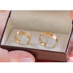 Alianças de casamento e noivado anatômicas com frisos em ouro 18k 750 com diamante.