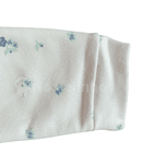 Macacão moletom peluciado branco floral com capuz Kiko Baby
