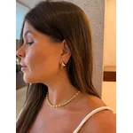 BRINCO TRIANGULO M BANHADO A OURO