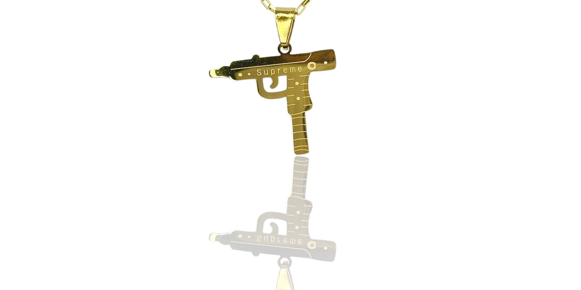 Pingente Metralhadora Aço Dourado 