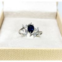 Anel em Ouro Folhas Com Pedra Gota Safira