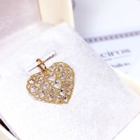 Pingente em Ouro 18k Coração Vazado com Zircônias