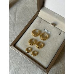 BRINCO ARGOLINHA ABAULADA BANHADA A OURO - BR97 - ANA B ACESSÓRIOS